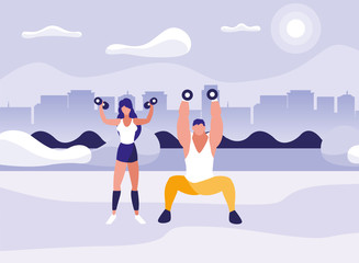 athletic man and woman weight lifting in the park