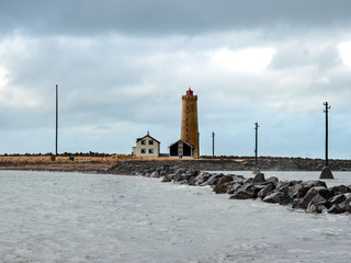 Fototapeta premium Favourite Lighthouse in Iceland with raw weather conditions