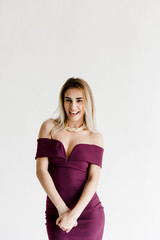 Fototapeta premium Portrait Young Blond Woman Dress Posing Studio