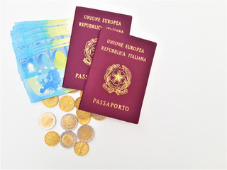 Naklejka premium Two italian passport with Euro banknotes