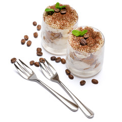 two portions Classic tiramisu dessert in a glass isolated on a white background
