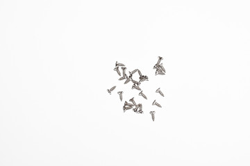The screw, nut and bolts on white background. Closeup isolated on a white background