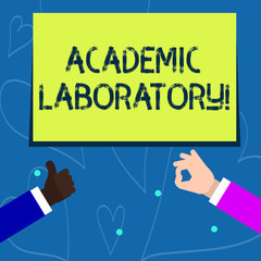Conceptual hand writing showing Academic Laboratory. Concept meaning where students can go to receive academic support Two Businessmen Hands Gesturing the Thumbs Up and Okay Sign