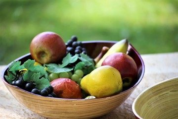 fresh plums in a basket
