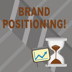 Word writing text Brand Positioning. Business photo showcasing creating a unique impression in the minds of the customers Successful Growth Chart with Arrow Going Up and Hourglass with Sand Sliding