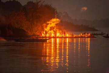 The festival of the illuminated boat procession on Mekong River.
