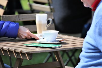 businessman working on laptop in cafe