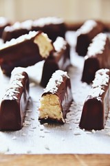 Homemade chocolate coconut bars. Sugar free, no bake. Keto, paleo, vegan bites