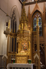 Fototapeta na wymiar Renovated gold Tabernacle with Marian icon in St Michael's Cathedral Toronto
