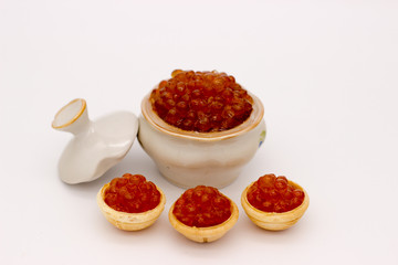 Luxury Red Caviar in the bowl. Food photo concept.