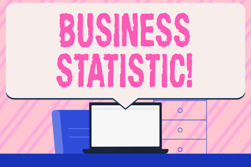 Conceptual hand writing showing Business Statistic. Concept meaning science of accurate and very quick decision makings Speech Bubble Pointing White Laptop Screen in Workspace Idea