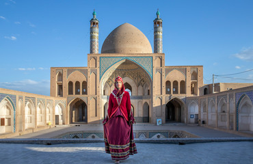 beautiful young iranian lady in a mosque