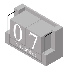 November 7th date on a single day calendar. Gray wood block calendar present date 7 and month November isolated on white background. Holiday. Season. Vector isometric illustration