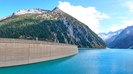 Dam with big lake in austrian Alps / Reservoir 