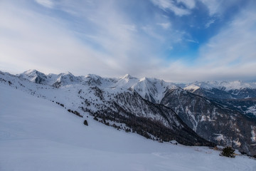 Winter panorama of mountains in Pitztal Hoch Zeiger ski resort in Austria Alps. Ski slopes. Beautiful winter day.