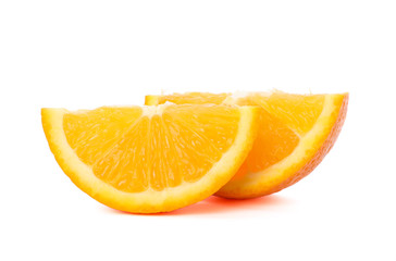 Pieces of ripe orange isolated on white background. Healthy food