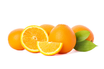 Ripe oranges with leaves isolated on white background. Citrus food