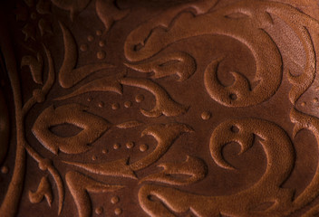 embossed leather. The leather floral pattern background