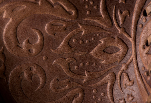embossed leather. The leather floral pattern background