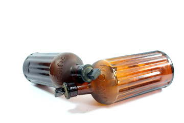 Vintage Brown Poison Bottles on White Background