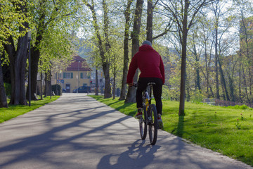 young cyclist on a city park