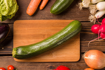 Zucchini and other fresh vegetables and ingredients for cooking