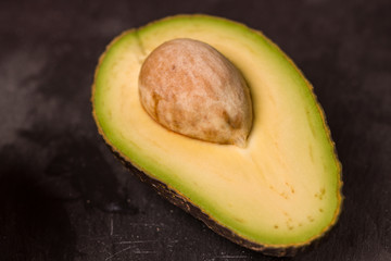 Avocado on black background
