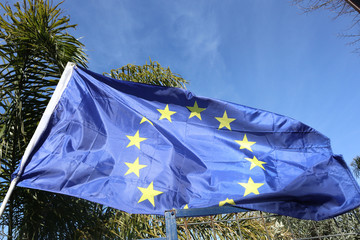 European Union flag on a background of blue sky