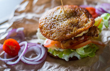 potato pancakes with meat, cheese, vegetables and sauce