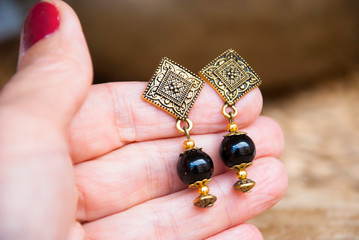 Bohemian gold earrings with black agate. Indian earrings.