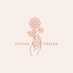 Vector abstract logo design template in trendy linear minimal style - hand with flower