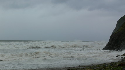 thunderstorm, stormy sea, bare rocks