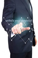 Businessman hand touching Unlock Your Potential button on virtual screen
