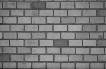 grey and white brick wall.