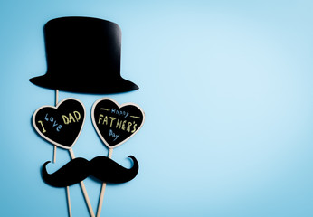 Happy Fathers Day concept,hat, black mustache with heart tag with Happy father's day text