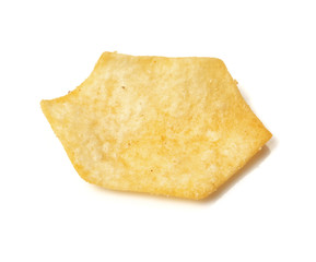 Tasty crispy potato chips isolated on white background