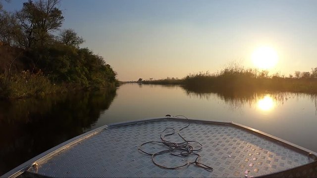 Sunset boat cruise on Cuando kwando river in Namibia Caprivi Strip