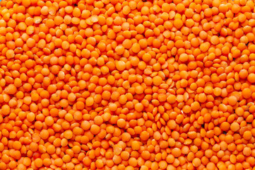 Red lentils. Background with lots of lentils.