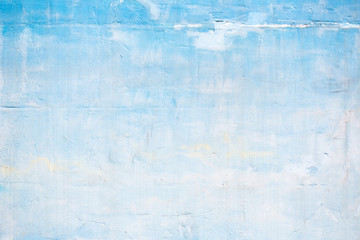 Blue and white painted grunge cracked  wall with texture for background.