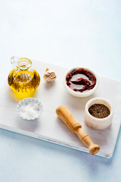 Curry paste and seasonings on a wooden board