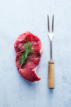 Seasoned sirloin steak with fork