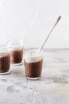 Three caffe mochas with spoon