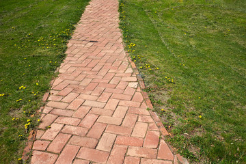 red clay bricks road background