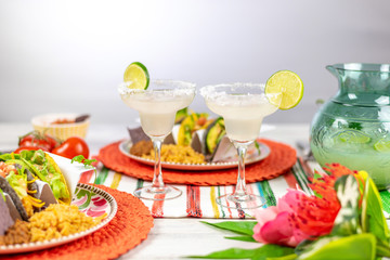 Margaritas with salt and limes and mexican food - 265540223