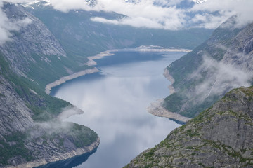 Trolltunga hike, Lake Ringedalsvatnet, Norway, Beautiful scandinavian landscape, Scandianavia, summer nature. Hike starts from Odda town