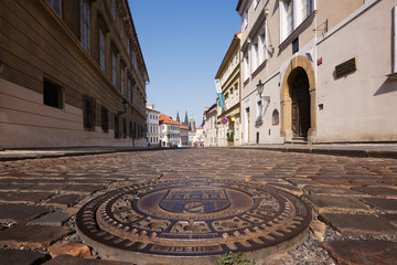 Manhole Cover on a Street in Hradcany