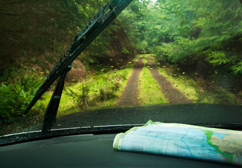 Windshield wipers and map on dashboard of car
