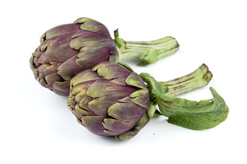 Fototapeta premium two artichokes closeup isolated withe background