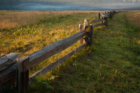 Wooden fence in rural landscape