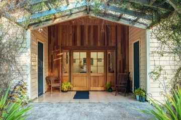 Vines growing over hotel entrance